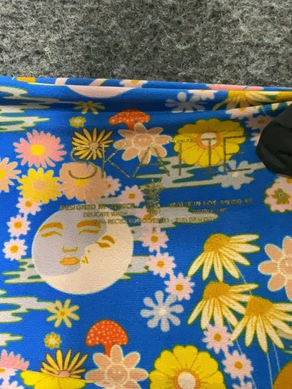 Skatie Medium Blue Floral Peace Sign One-Shoulder Swimsuit